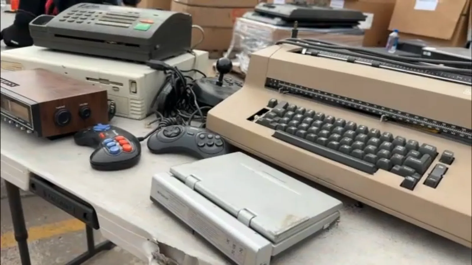Stacks of old electronics collected at a Houston recycling drive