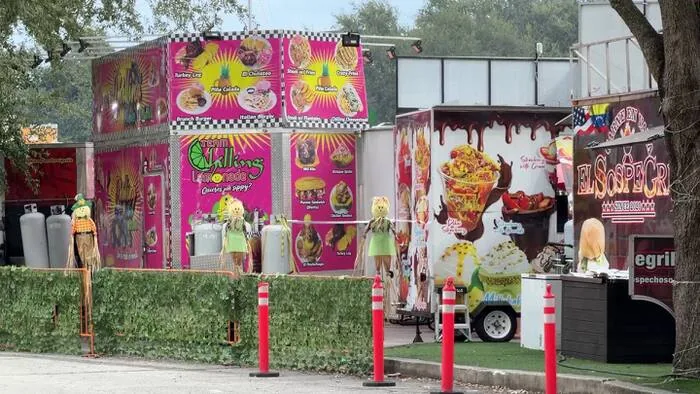 Food truck park seating area at World Food Trucks in Kissimmee after a vendor dispute